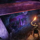 A tarnished looks at a cave of crystals in Elden Ring.